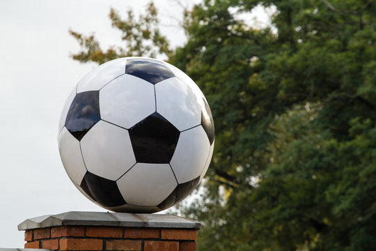 Soccer ball made of marble, decorative architectural element