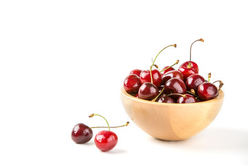 Cherry berries in wooden bowl