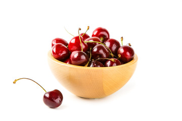 Cherry berries in wooden bowl