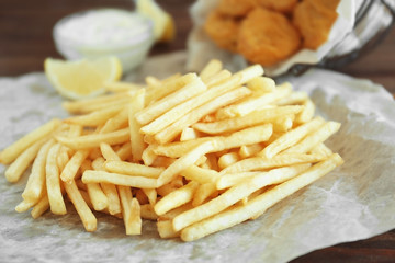 French fries on paper, closeup