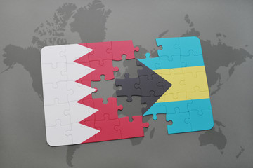 puzzle with the national flag of bahrain and bahamas on a world map background.