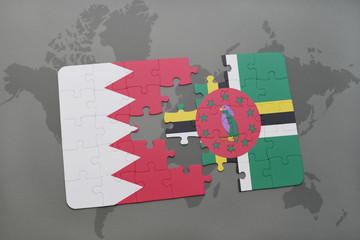 puzzle with the national flag of bahrain and dominica on a world map background.