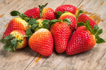 Closeup Ripe strawberry and fresh on plank
