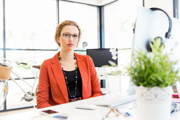 Young woman in office