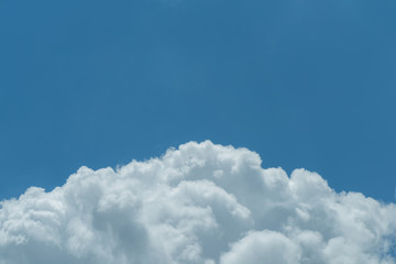 Naklejka na ściany i meble Beautiful white cumulus clouds with blue sky