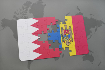 puzzle with the national flag of bahrain and moldova on a world map background.