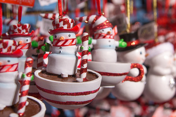 Marshmallow snowmen on the cup in christmas toy market