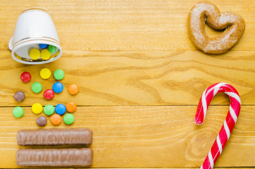 beautiful candies on a wooden background