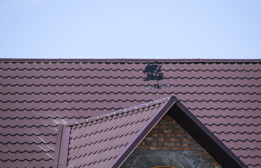 Naklejka premium The roof of corrugated sheet