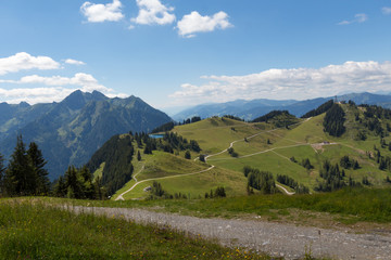Fototapeta na wymiar Landscape in Austrian Alps with roads and a lake