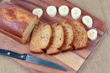 Homemade banana cake with sliced banana on butcher served.Selective focus.