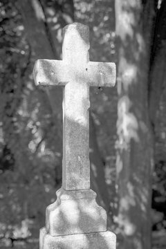 Black and white photo with a cross.