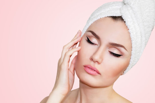 Beautiful Natural Girl Woman After Cosmetic Procedures , Facelift , Facial Massage , Visit A Beautician , Massage Lines. Beautiful Woman With A Towel On His Head. Plastic And Cosmetic Surgery. 