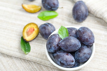 Ripe plums in the bowl