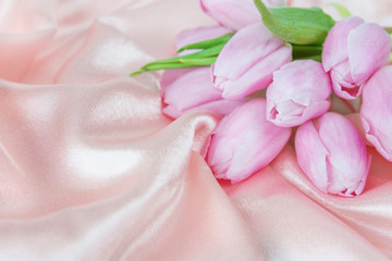 Fototapeta na wymiar Flowers on a silk fabric