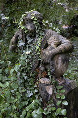 Historic Statue on the mystery old Prague Cemetery, Czech Republic