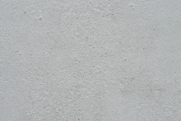 Wall fragment with scratches and cracks