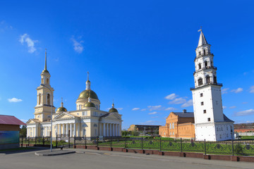 Fototapeta na wymiar Cathedral and leaning tower in Nevyansk, Russia