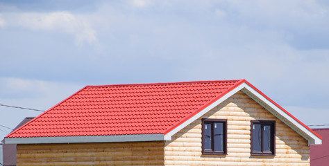 The roof of corrugated sheet on the houses