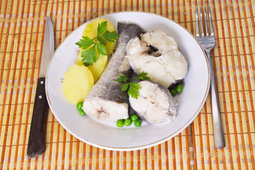 baked hake with potatoes