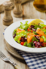 Fresh salad with smoked salmon.