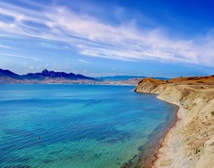 Sea, sky and the Black sea coast, Crimea/The view from the Bay is Dead. Deserted beach of the Bay, bearing the name 