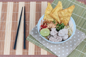 Crispy noodle in spicy sour soup as 