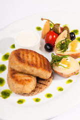 Pike cutlets with garnish