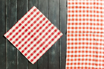 Obraz premium tablecloth on black wooden table