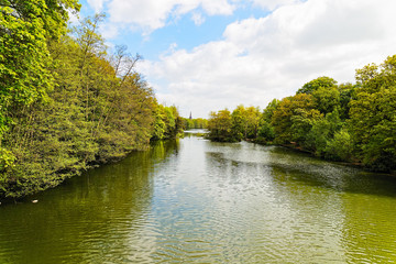 Down the long narrow tree lined lake to a church