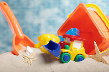 Children's toys on sand