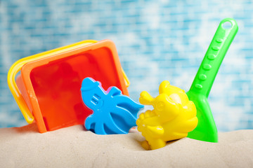 Children's toys on sand