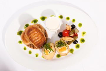 Pike cutlets with garnish