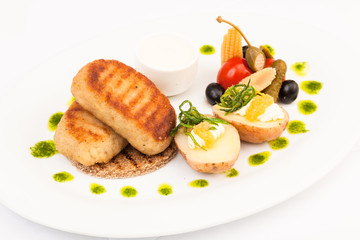 Pike cutlets with garnish