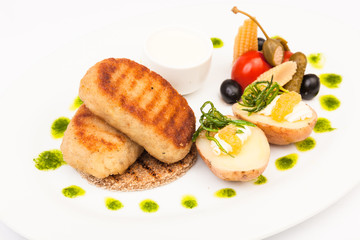 Pike cutlets with garnish