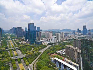 Obraz premium Aerial photography of City viaduct bridge road with landmark bui