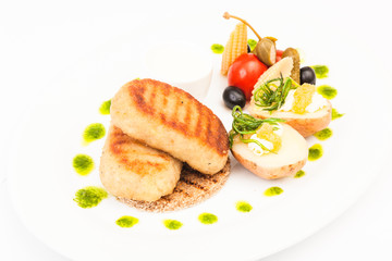 Pike cutlets with garnish