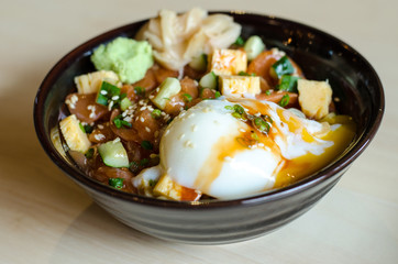 Japanese traditional dish Gyudon made from thinly sliced beef, o