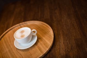 cup on wooden background