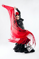 Pretty young flamenco dancer in beautiful dress. - obrazy, fototapety, plakaty