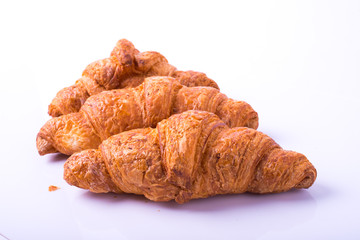 fresh croissant on white background