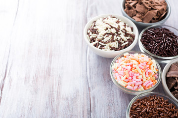 Assorted dutch hagelslag sprinkles. Netherlands traditional sweets for breakfast. Copy space.