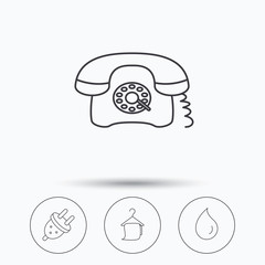 Retro phone, bath towel and electric plug.