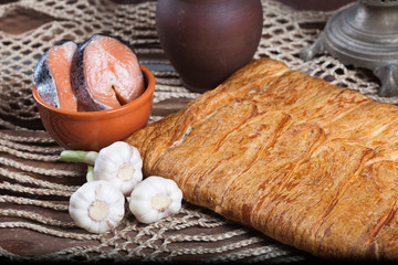 Pie on the table with food set
