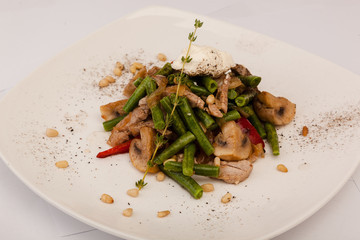 mushroom salad with beans and pork