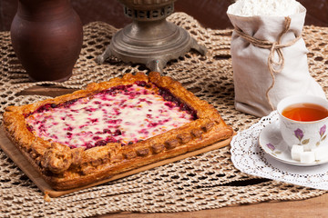 Pie on the table with food set