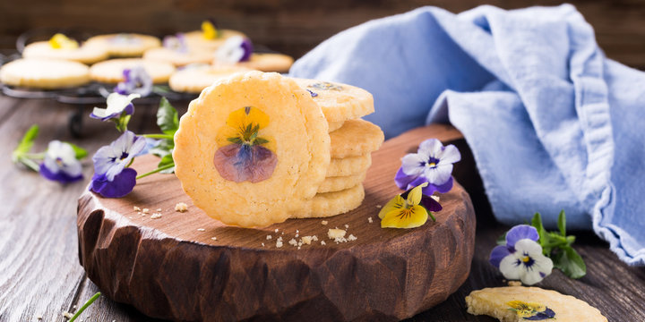 Homemade shortbread cookies with edible flowers