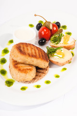 Pike cutlets with garnish
