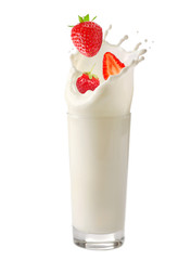 Milk splash with falling fresh tasty strawberry isolated on white
