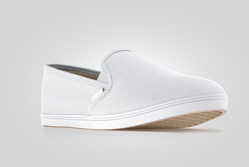 Blank grey slip-on shoe design mock up, isolated, clipping path, 3d rendering. Plain hipster slipon mockup template stand profile view. Urban skate boot with clear label presentation.